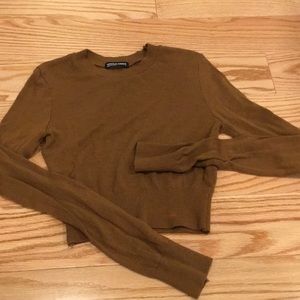 a brown long sleeve